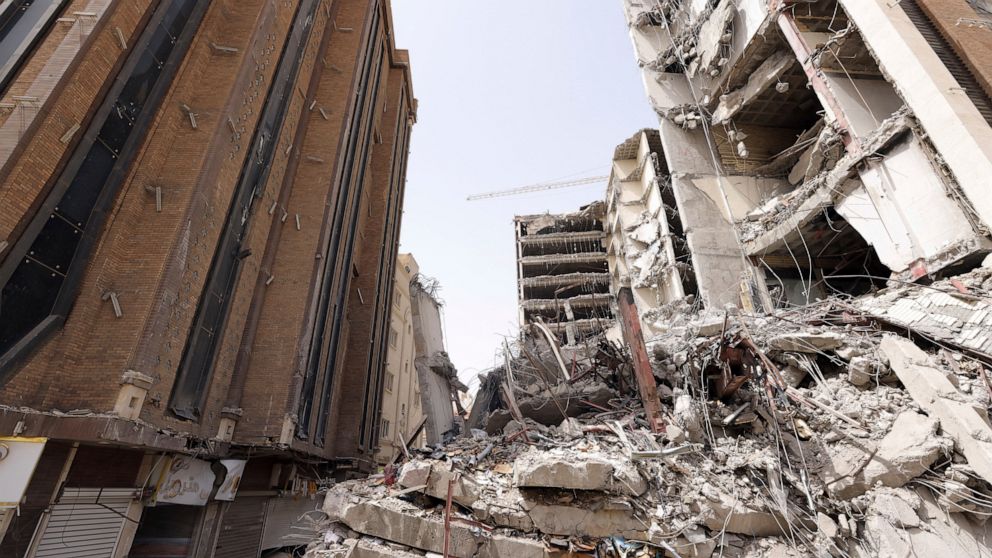 In this photo released by official website of the office of Iranian Senior Vice-President, on Friday, May 27, 2022, ruins of a tower at under construction 10-story Metropol Building remains after it collapsed on Monday, in the southwestern city of Ab